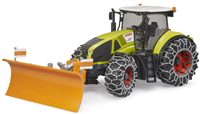 Claas Axion 950 mit R&amp;#228;umschild und Schneeketten